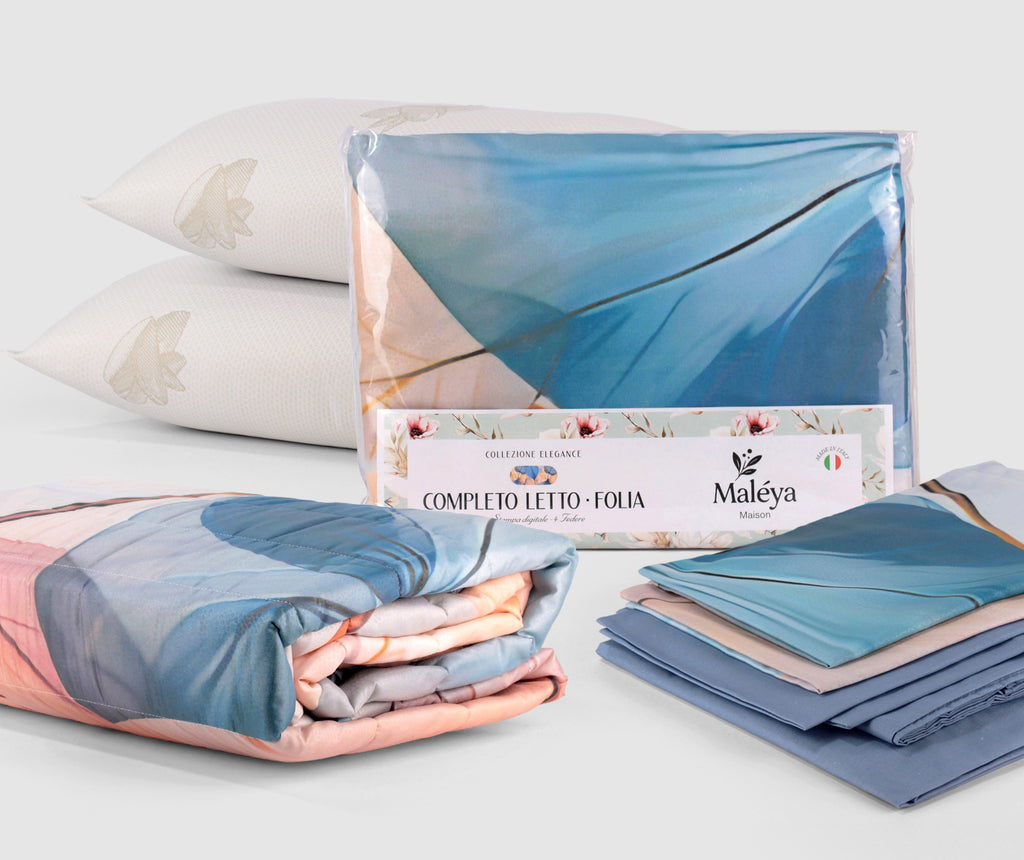 Set matrimoniale FOLIA con completo letto, trapuntino coordinato da 250×270 cm e due guanciali ARGANA con olio di Argan.