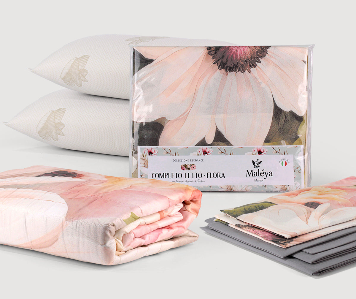 Set matrimoniale FLORA con completo letto panna o grigio, trapuntino floreale da 250×270 cm e due guanciali ARGANA con olio di Argan.