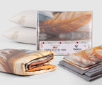 Set INDIA matrimoniale nelle varianti tortora moka e grigio, con completo letto, trapuntino coordinato e due guanciali ARGANA con olio di Argan.