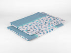 Completo letto DRIMIA PARTY con fantasia geometrica azzurra, verde acqua e grigia. Disponibile in diverse taglie.
