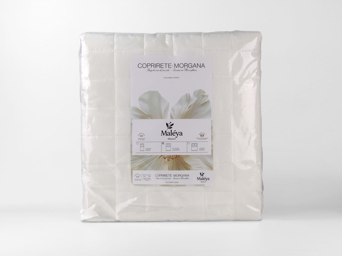 Coprirete MORGANA bianco da 1 piazza e mezza, misura 120×190 cm, con laccetti agli angoli.