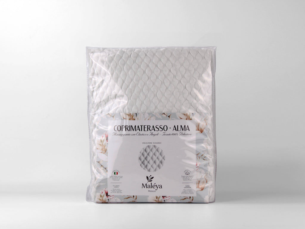 Coprimaterasso ALMA singolo bianco con lavorazione trapuntata e elastico agli angoli.