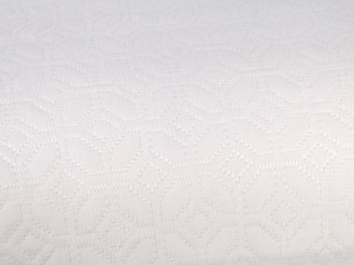 Guanciale NOA in memory foam con profilo basso e altezza di 13 cm.