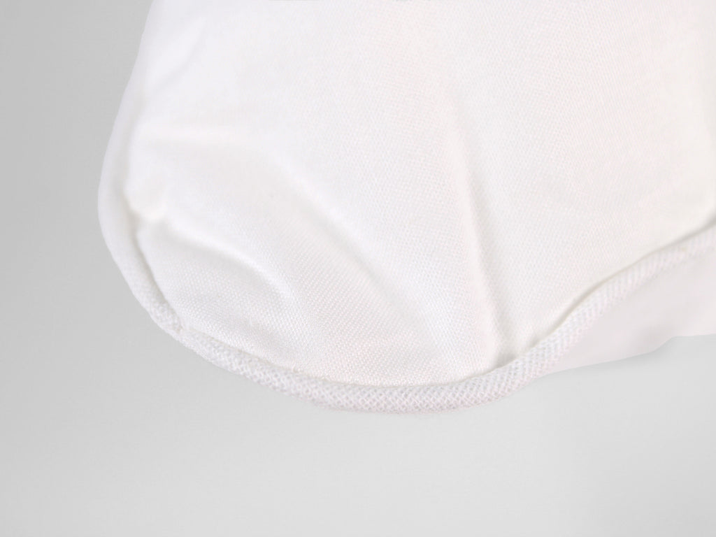 Guanciale PLUMIA bianco extra soffice con imbottitura effetto piuma e federa traspirante in cotone.
