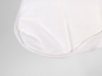 Guanciale PLUMIA bianco extra soffice con imbottitura effetto piuma e federa traspirante in cotone.