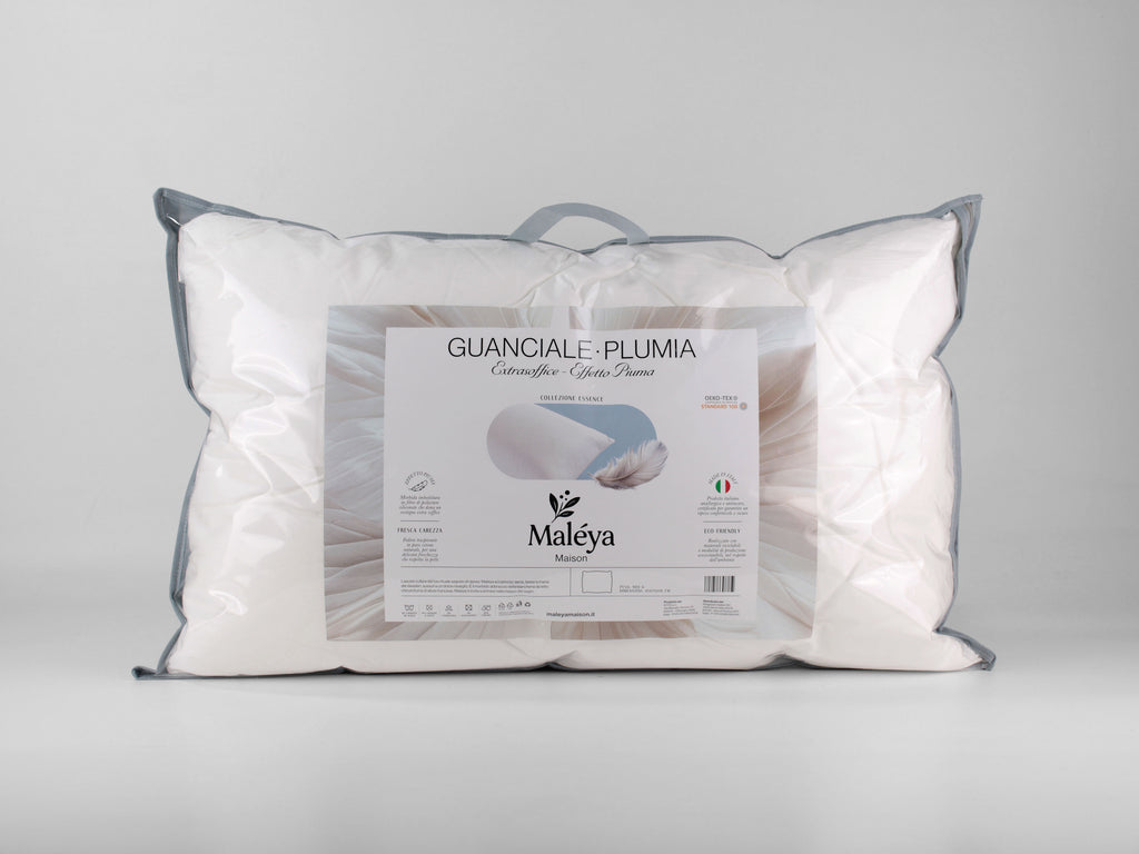 Guanciale PLUMIA bianco extra soffice con imbottitura effetto piuma e federa traspirante in cotone.