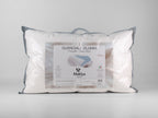 Guanciale PLUMIA bianco extra soffice con imbottitura effetto piuma e federa traspirante in cotone.