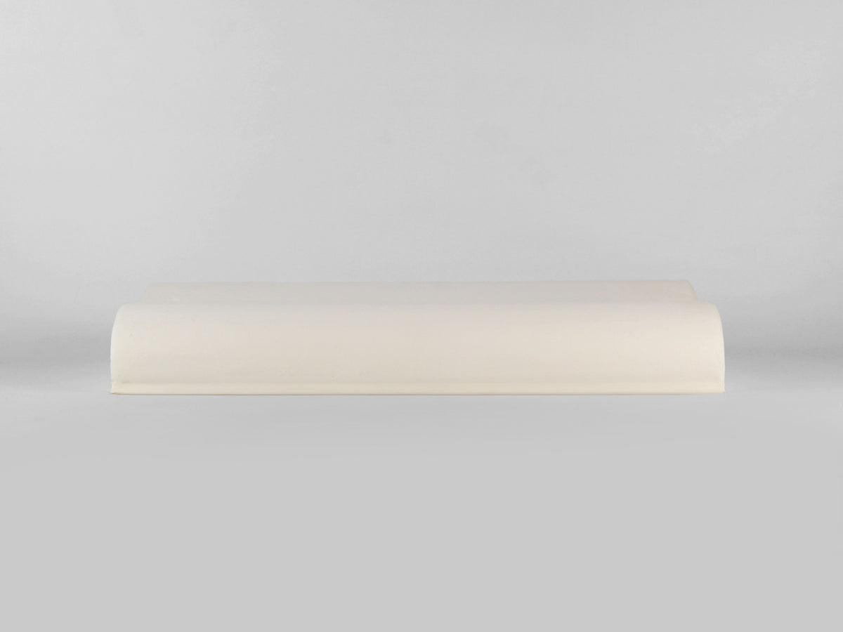 Guanciale NALEA bianco in memory foam cervicale con profilo ergonomico sagomato.
