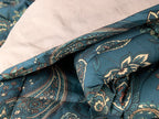 Piumone matrimoniale MOENA a due piazze con fantasia decorativa e lato interno in tinta coordinata.